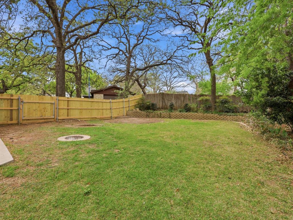 209 Valley View Court Azle, TX 76020 - Photo 35 of 39 View of fenced backyard
