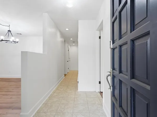 a view of a hallway with closet
