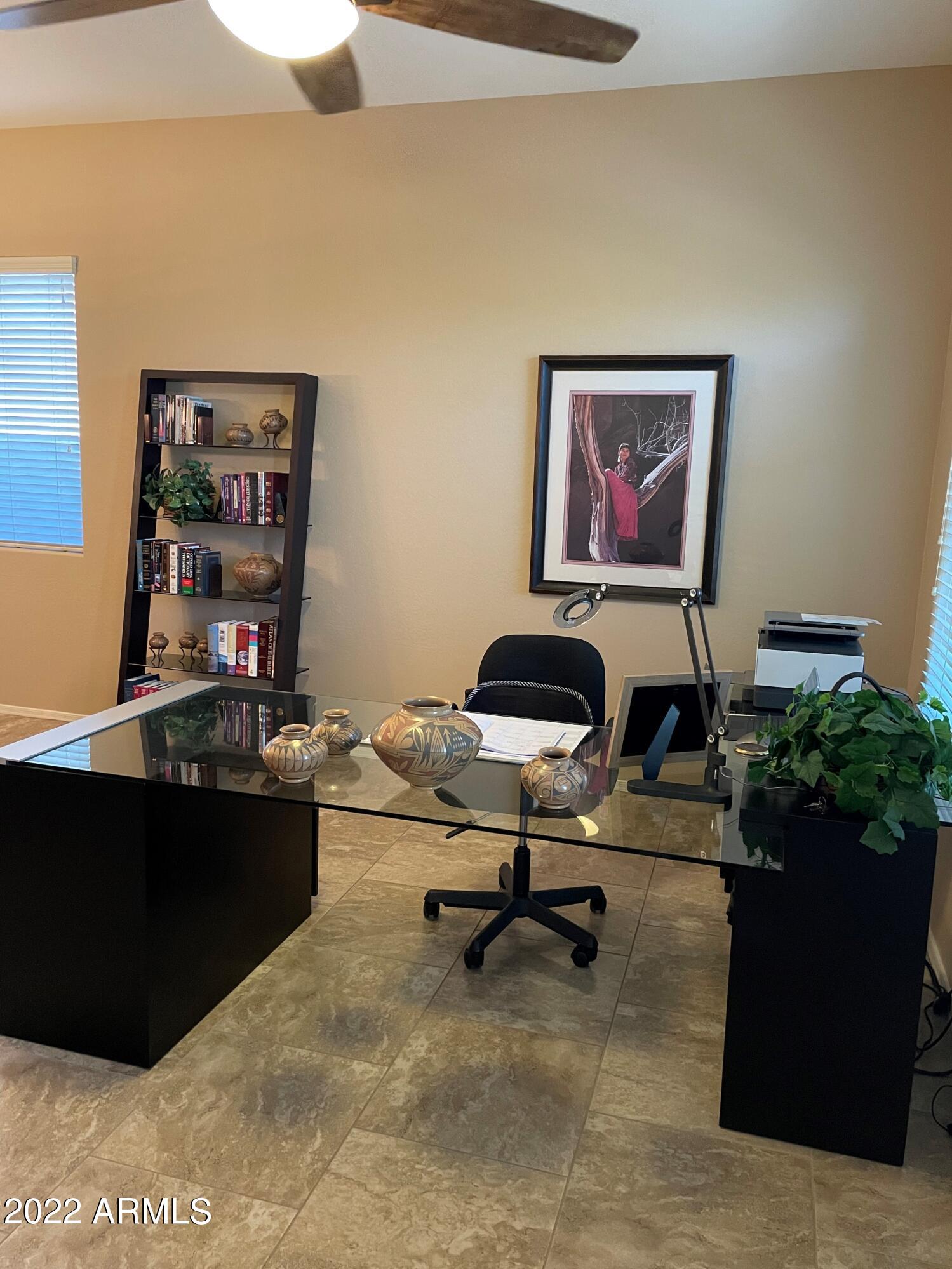 4604 West Moss Springs Road Phoenix, AZ 85086 - Photo 2 of 15 a view of a workspace with furniture