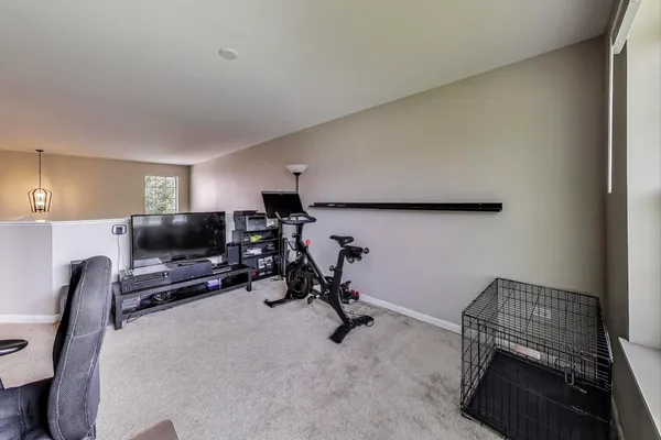 a view of workspace with furniture and a couch