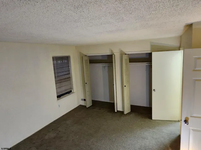 an empty room with closet