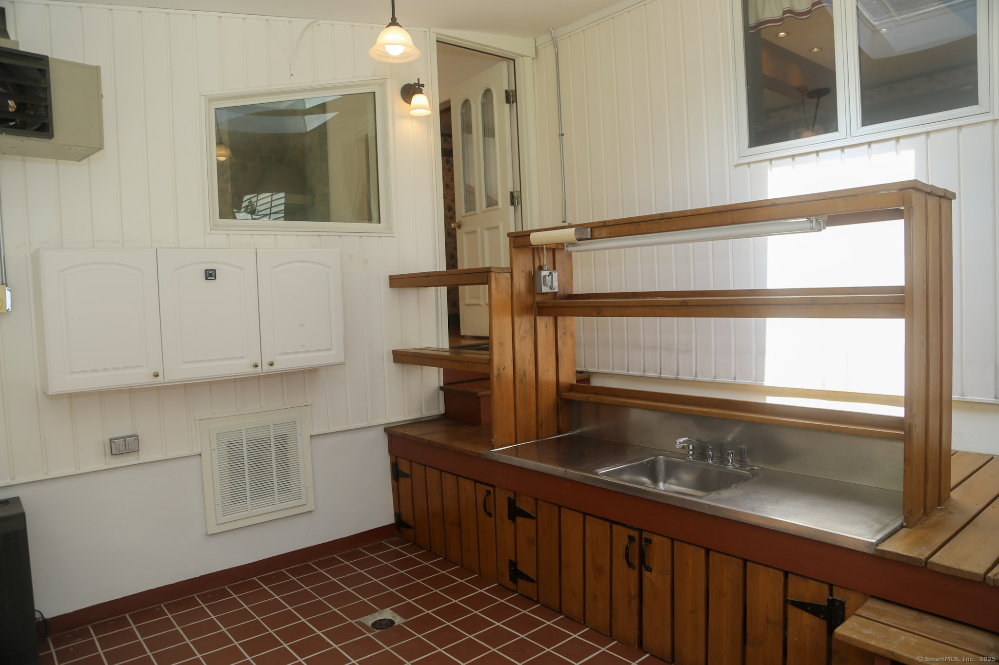 189 Crane Hollow Road Bethlehem, CT 06751 - Photo 19 of 40 a kitchen with a sink and cabinets