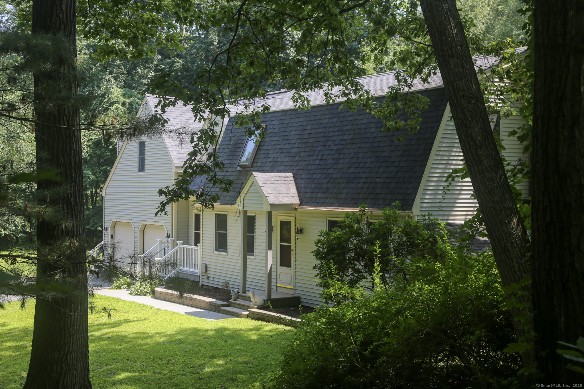189 Crane Hollow Road Bethlehem, CT 06751 - Photo 2 of 40 a view of a house with a yard