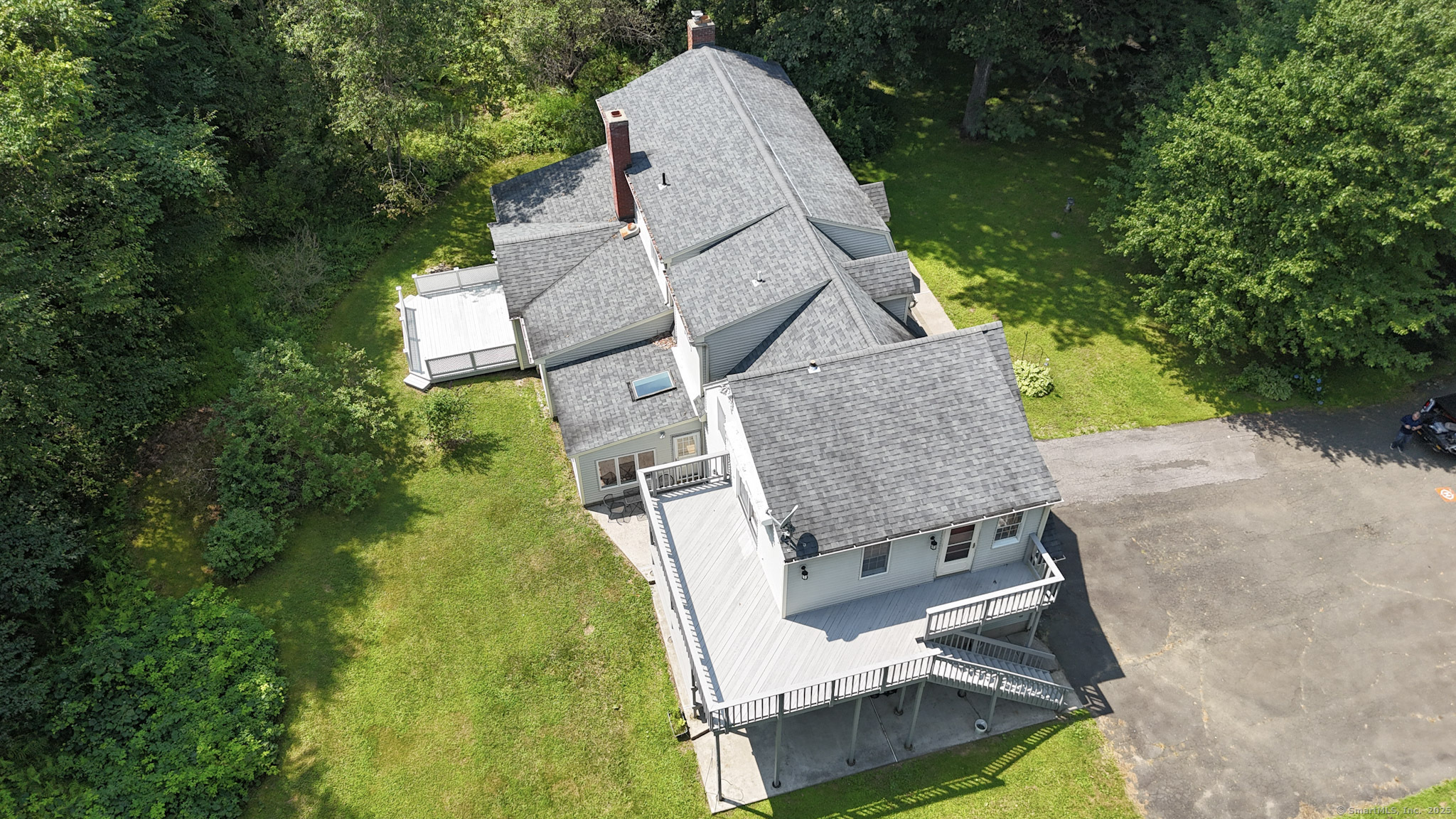 189 Crane Hollow Road Bethlehem, CT 06751 - Photo 21 of 40 an aerial view of a house with swimming pool and big yard