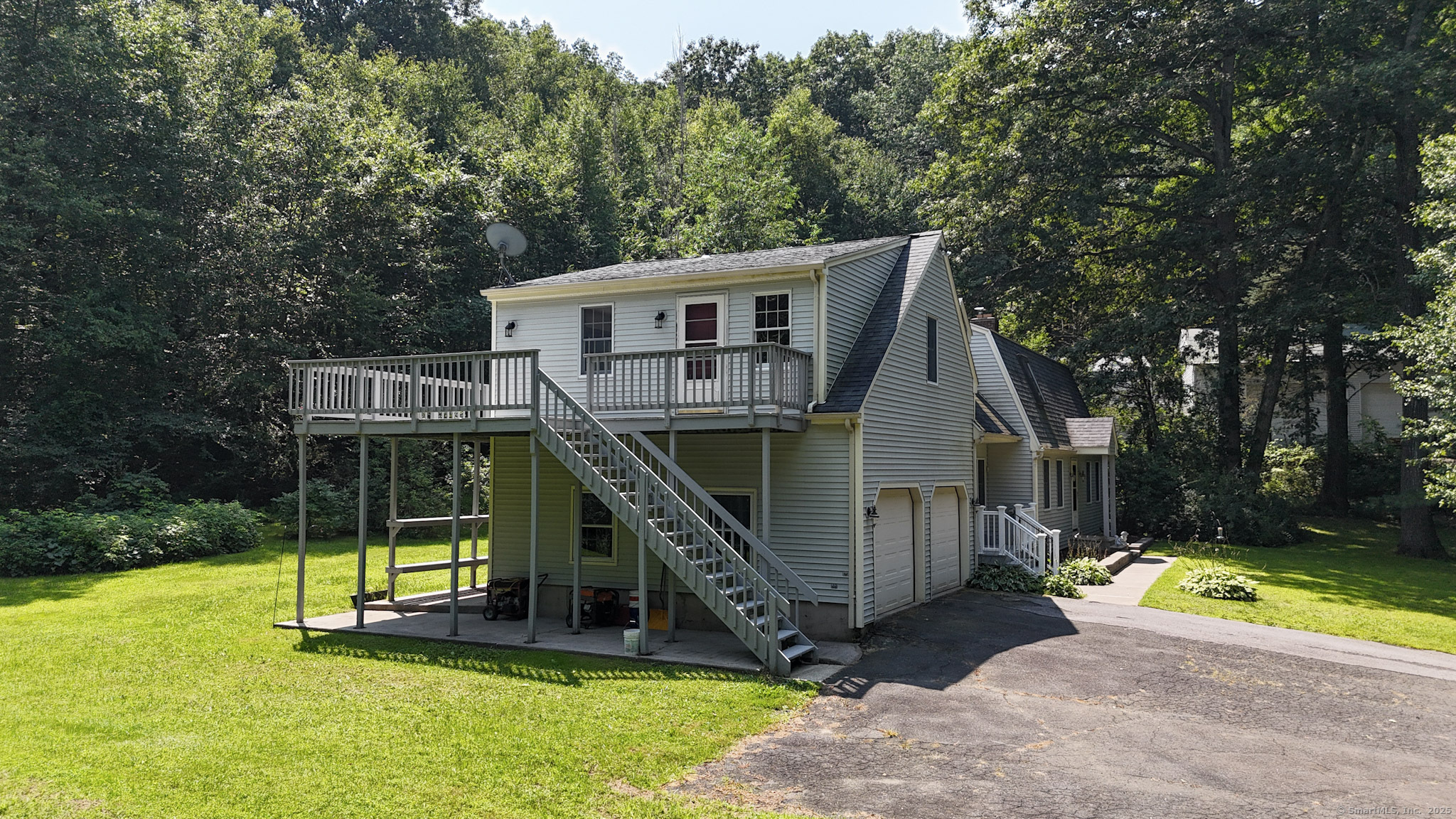 189 Crane Hollow Road Bethlehem, CT 06751 - Photo 23 of 40 a view of a house with pool and a yard