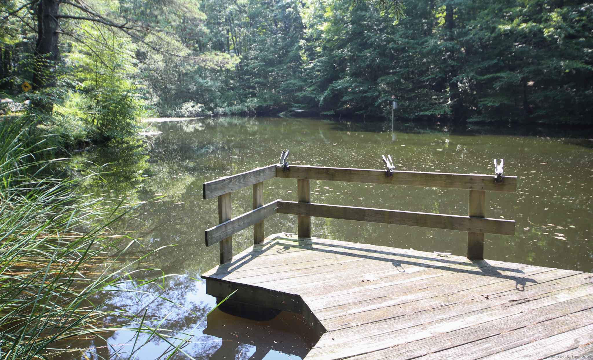 189 Crane Hollow Road Bethlehem, CT 06751 - Photo 28 of 40 a view of a lake from a balcony