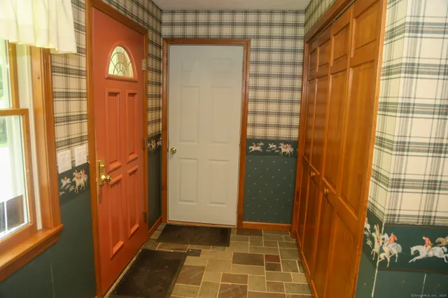 a bathroom with a sink and a large mirror