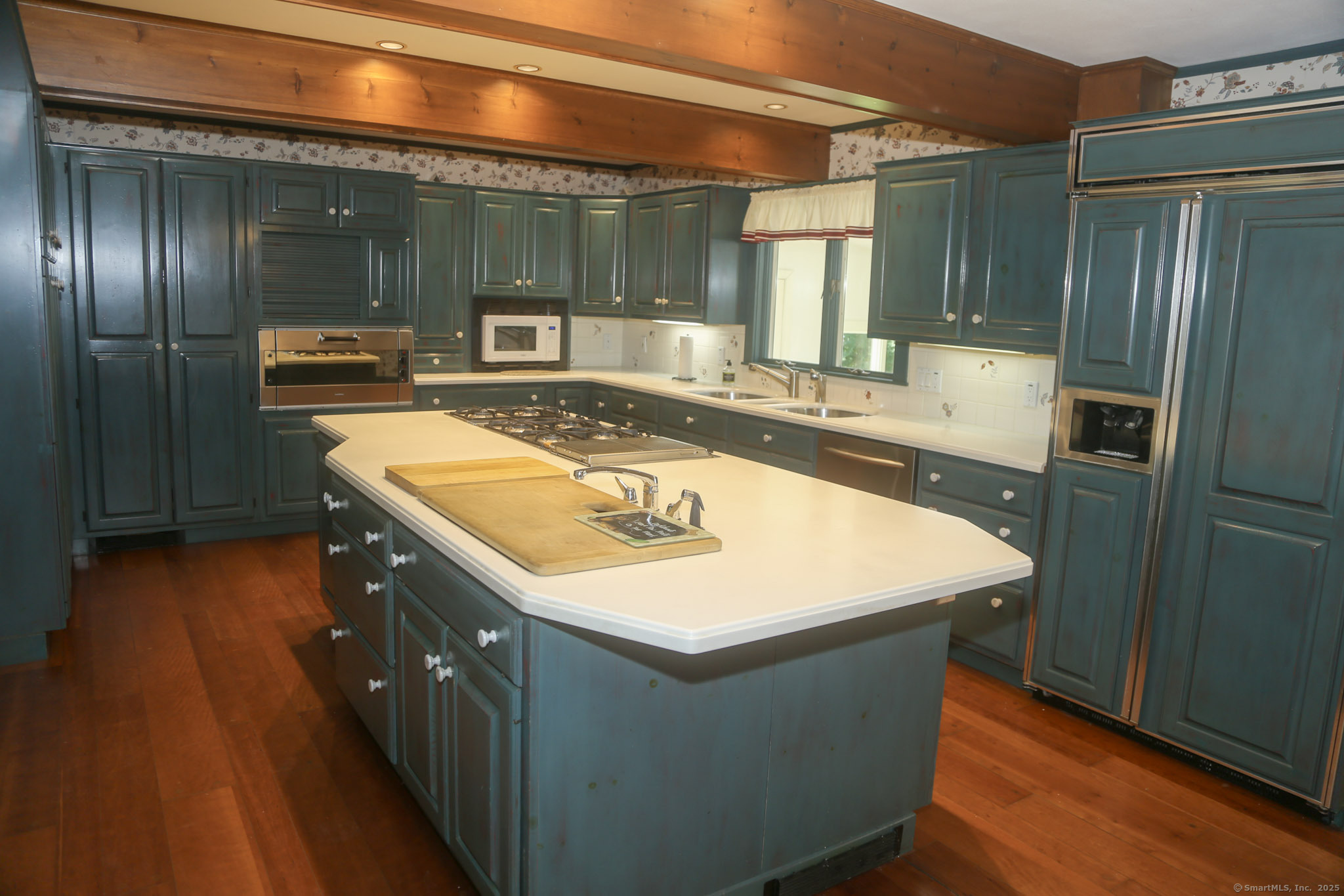 189 Crane Hollow Road Bethlehem, CT 06751 - Photo 4 of 40 a bathroom with a sink and a large mirror