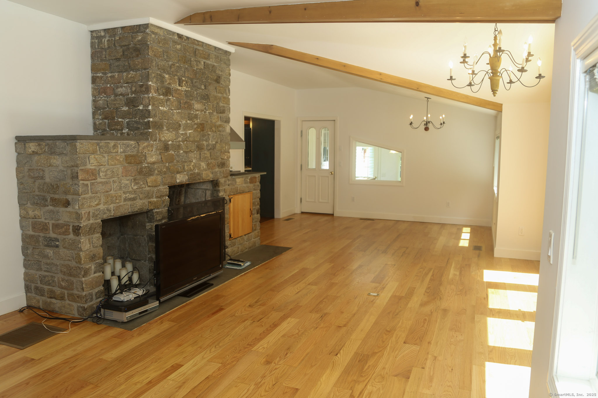189 Crane Hollow Road Bethlehem, CT 06751 - Photo 8 of 40 a spacious bathroom with a granite countertop sink and a mirror