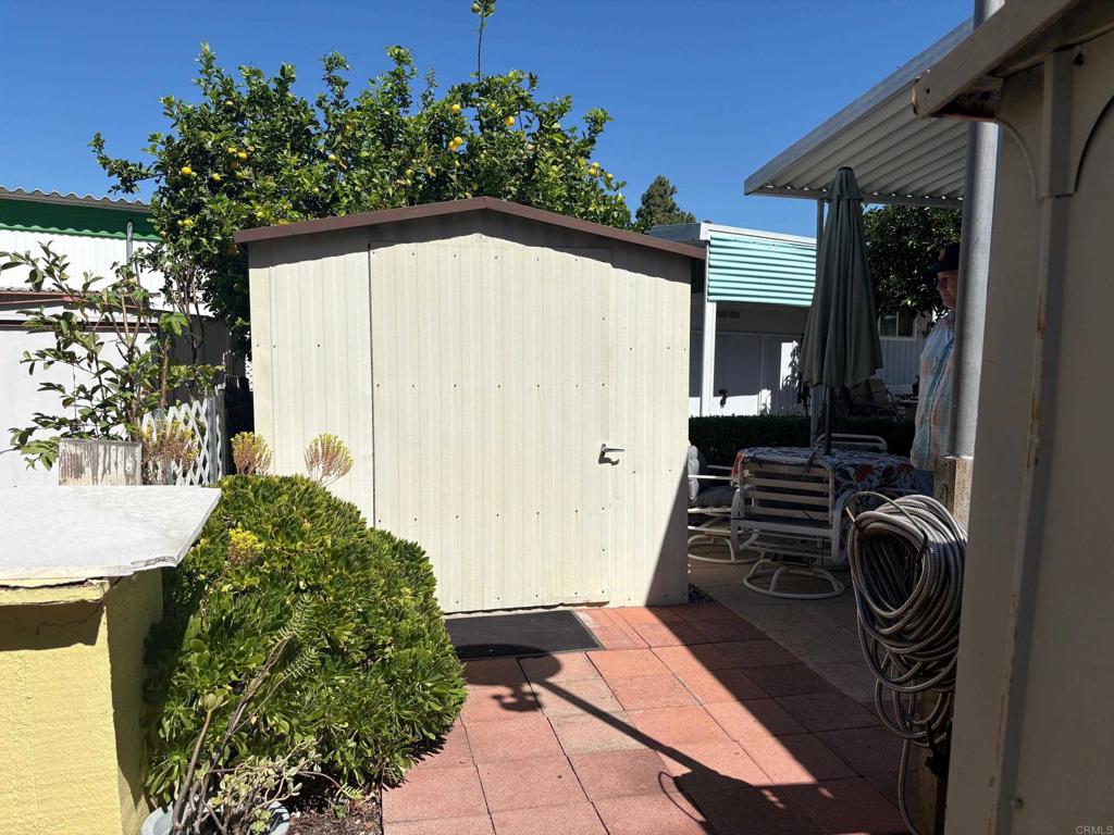 1174 East Main Street, Unit 113 El Cajon, CA 92021 - Photo 18 of 25 a backyard of a house