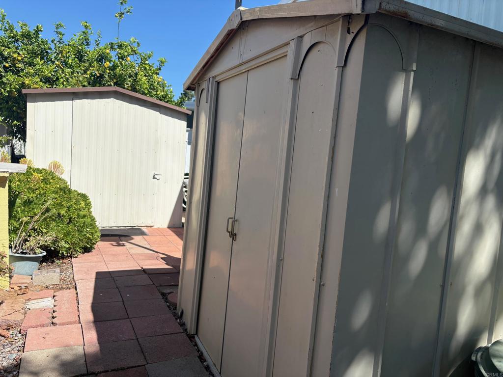 1174 East Main Street, Unit 113 El Cajon, CA 92021 - Photo 19 of 25 a view of a house with a hallway