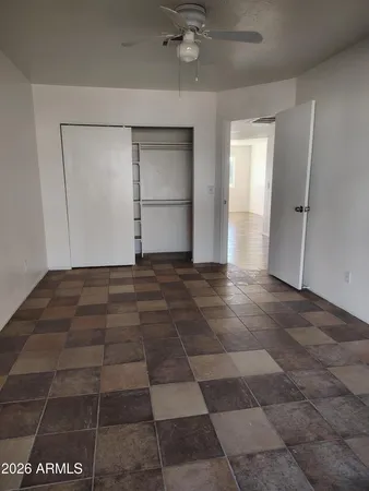 a view of empty room with a fireplace