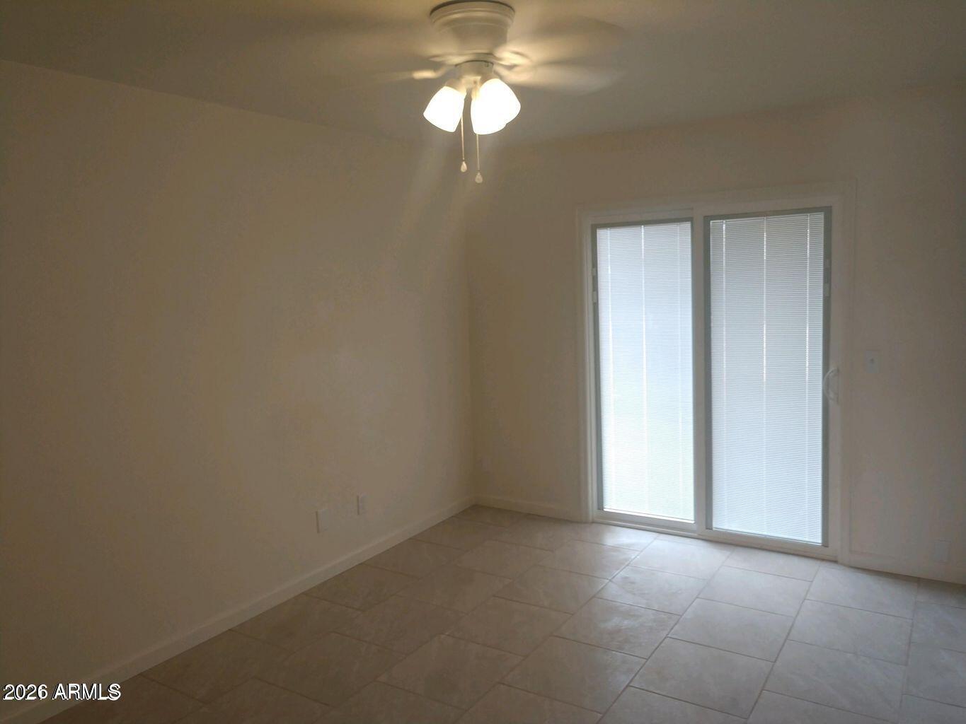 2560 South Yavapai Road Apache Junction, AZ 85119 - Photo 25 of 31 a view of empty room with window