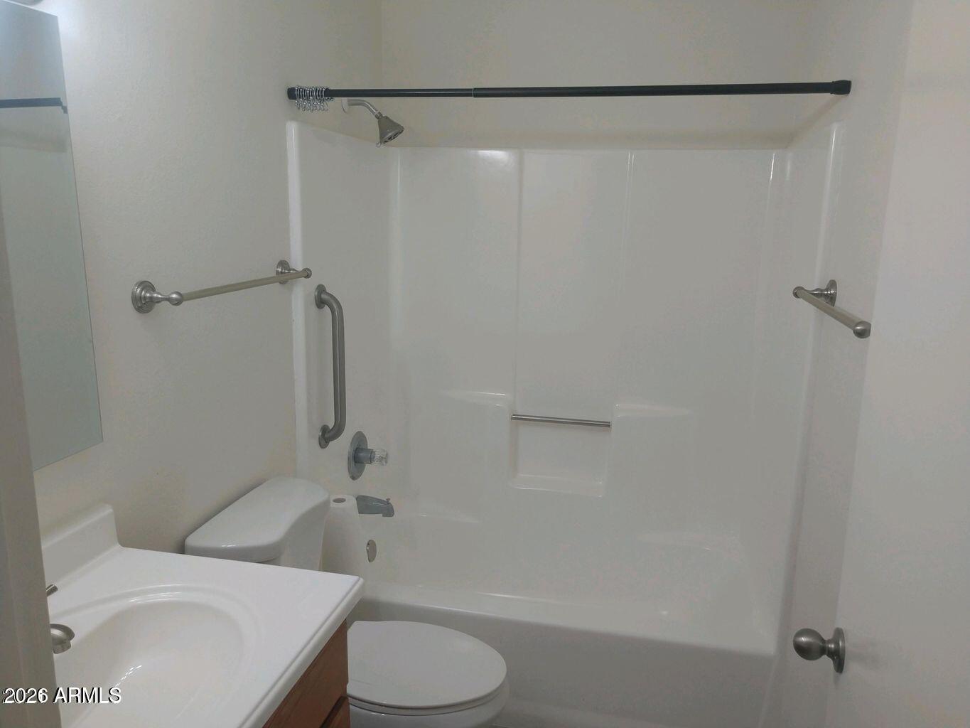 2560 South Yavapai Road Apache Junction, AZ 85119 - Photo 26 of 31 a bathroom with a shower a toilet and sink