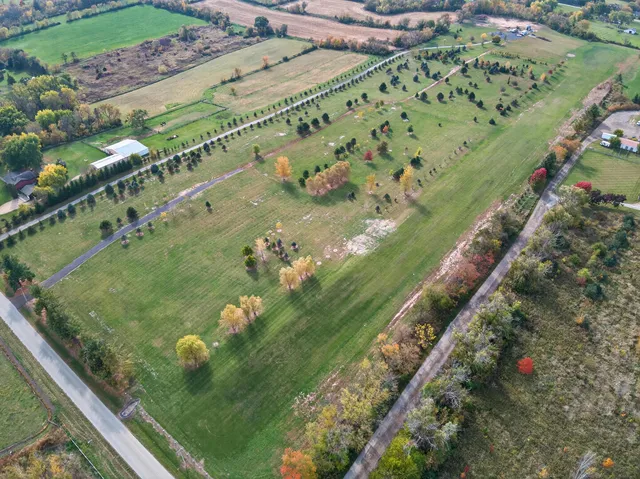 a view of a golf course with a garden