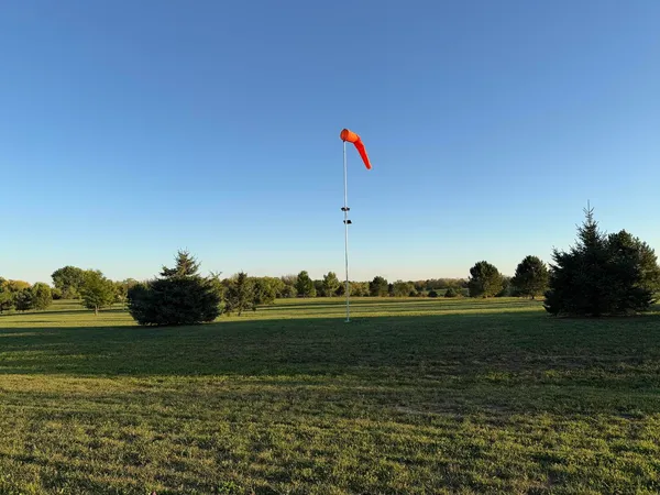 a view of a golf course with a lake
