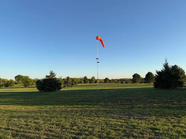 a view of a golf course with a lake
