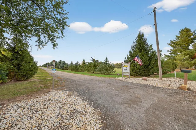 a view of a backyard of a house