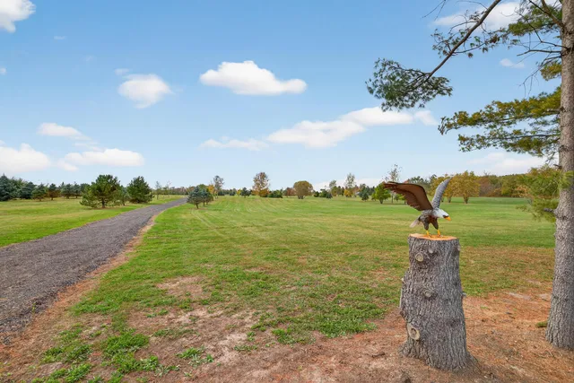a view of a lake with a big yard