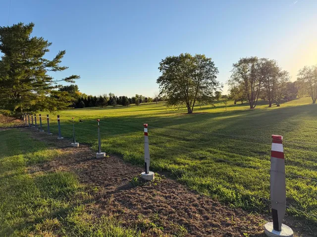 a view of a lake with a big yard