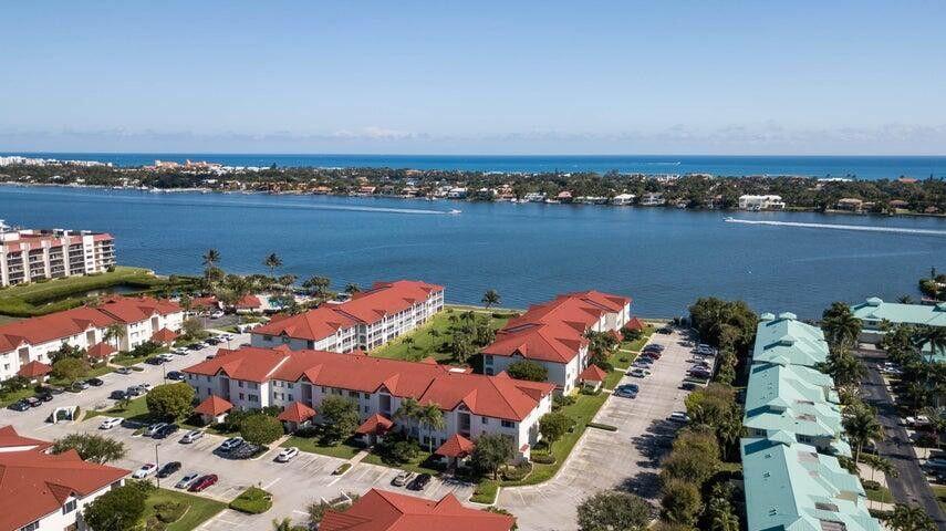 110 Half Moon Circle, Unit E2 Hypoluxo, FL 33462 - Photo 10 of 14 an aerial view of a city