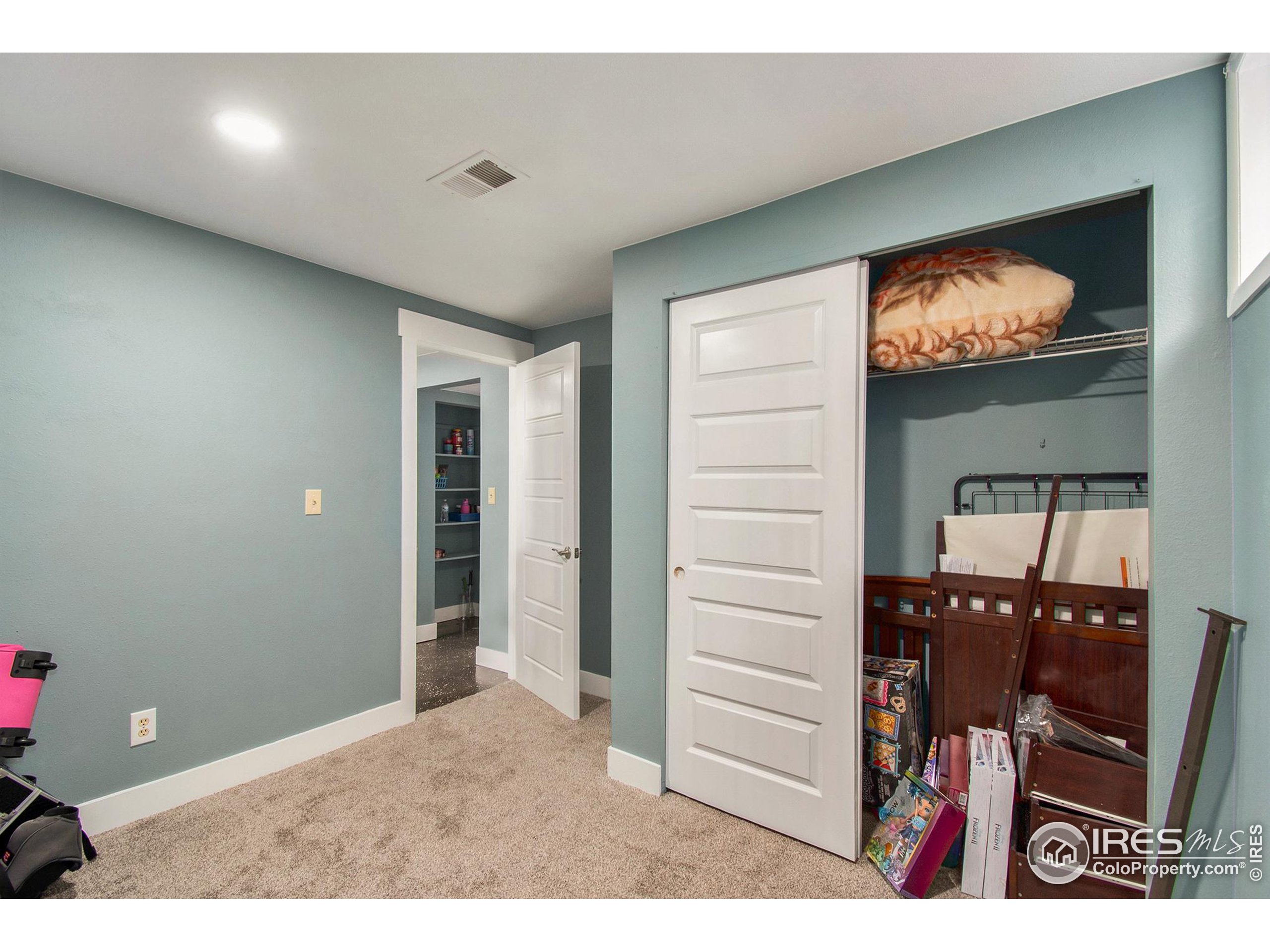 3231 West 5th St Road Greeley, CO 80634 - Photo 23 of 31 a view of a hallway with workspace