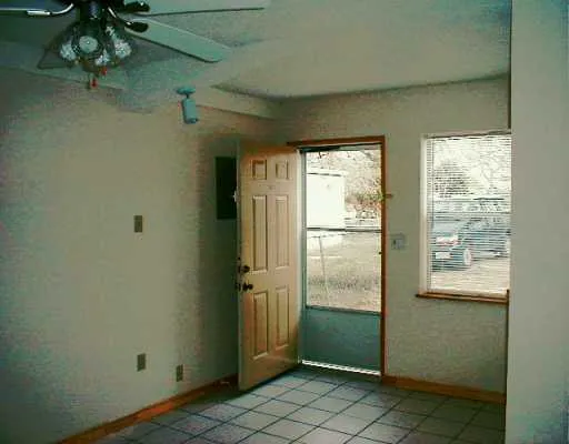 a view of a room with a window