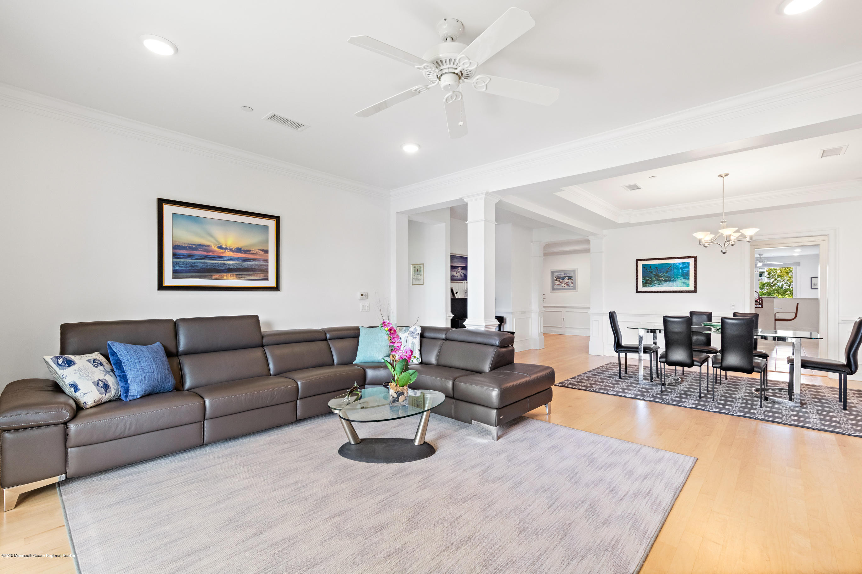 2201 River Road, Unit 1203 Point Pleasant, NJ 08742 - Photo 1 of 51 a living room with furniture potted plant and kitchen view