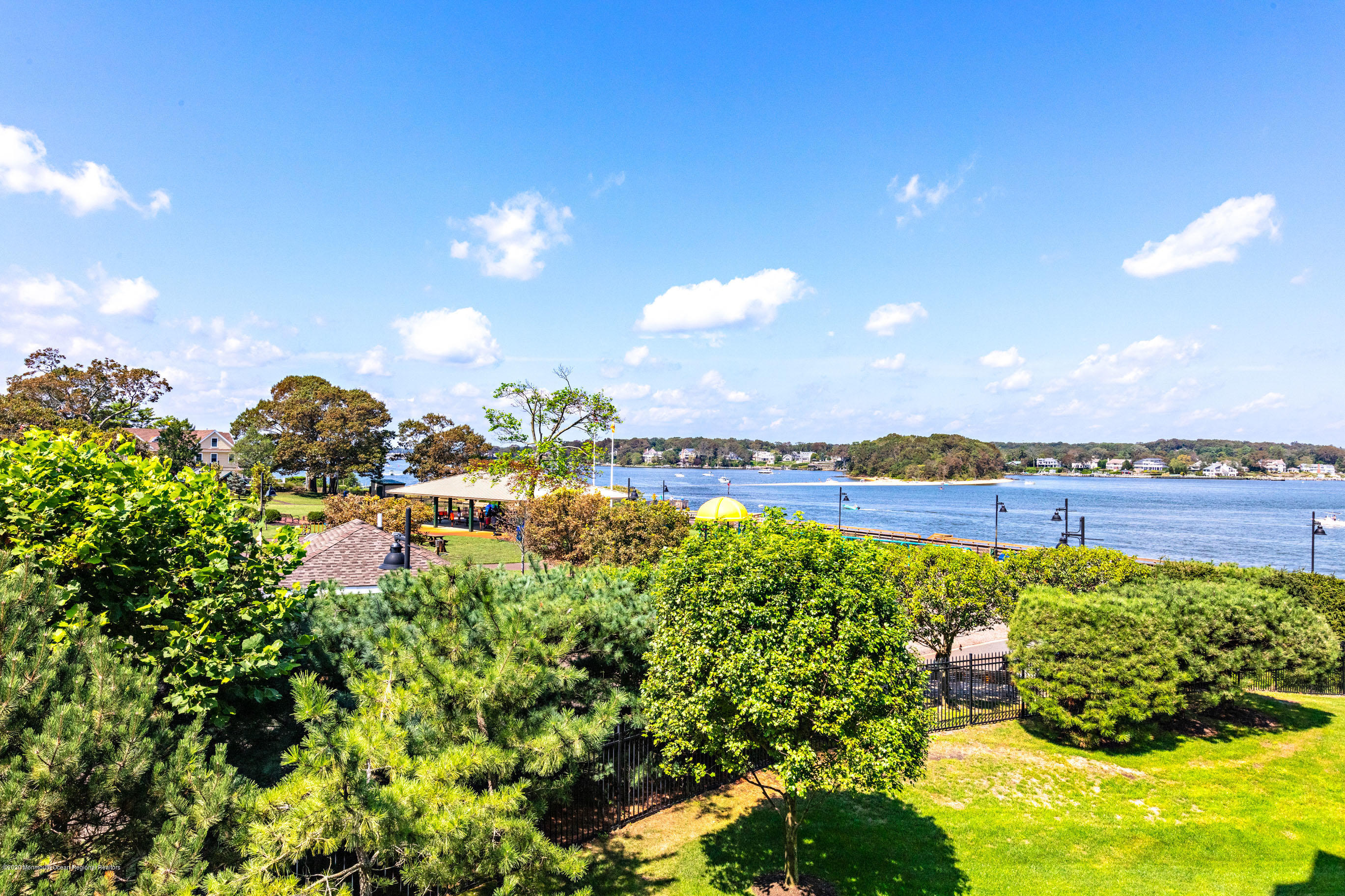 2201 River Road, Unit 1203 Point Pleasant, NJ 08742 - Photo 13 of 51 a view of a lake with a house
