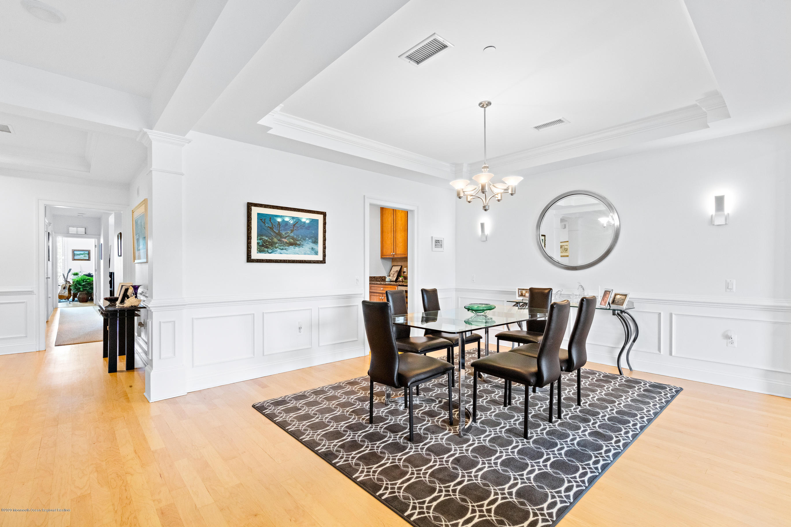 2201 River Road, Unit 1203 Point Pleasant, NJ 08742 - Photo 16 of 51 a view of a dining room with furniture