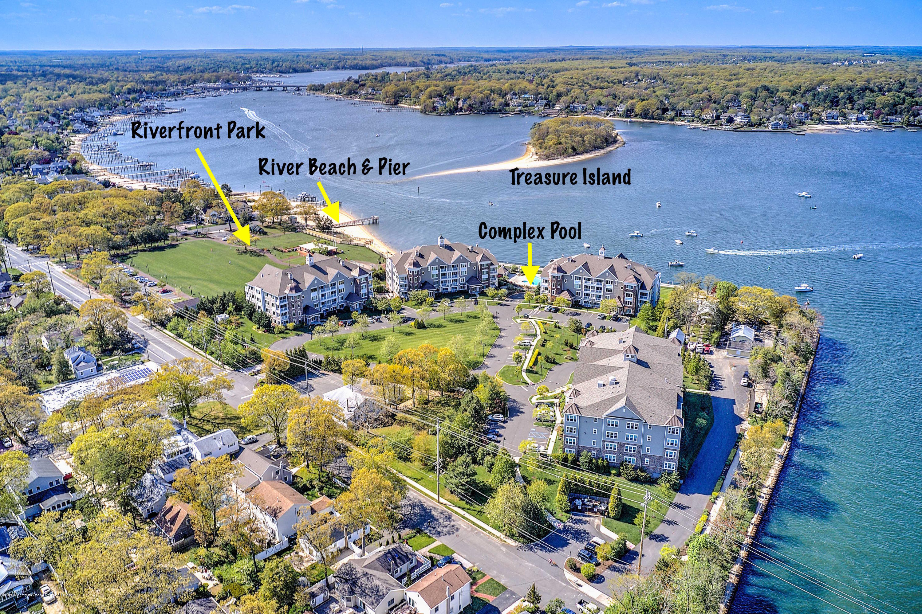 2201 River Road, Unit 1203 Point Pleasant, NJ 08742 - Photo 3 of 51 an aerial view of a house with a garden
