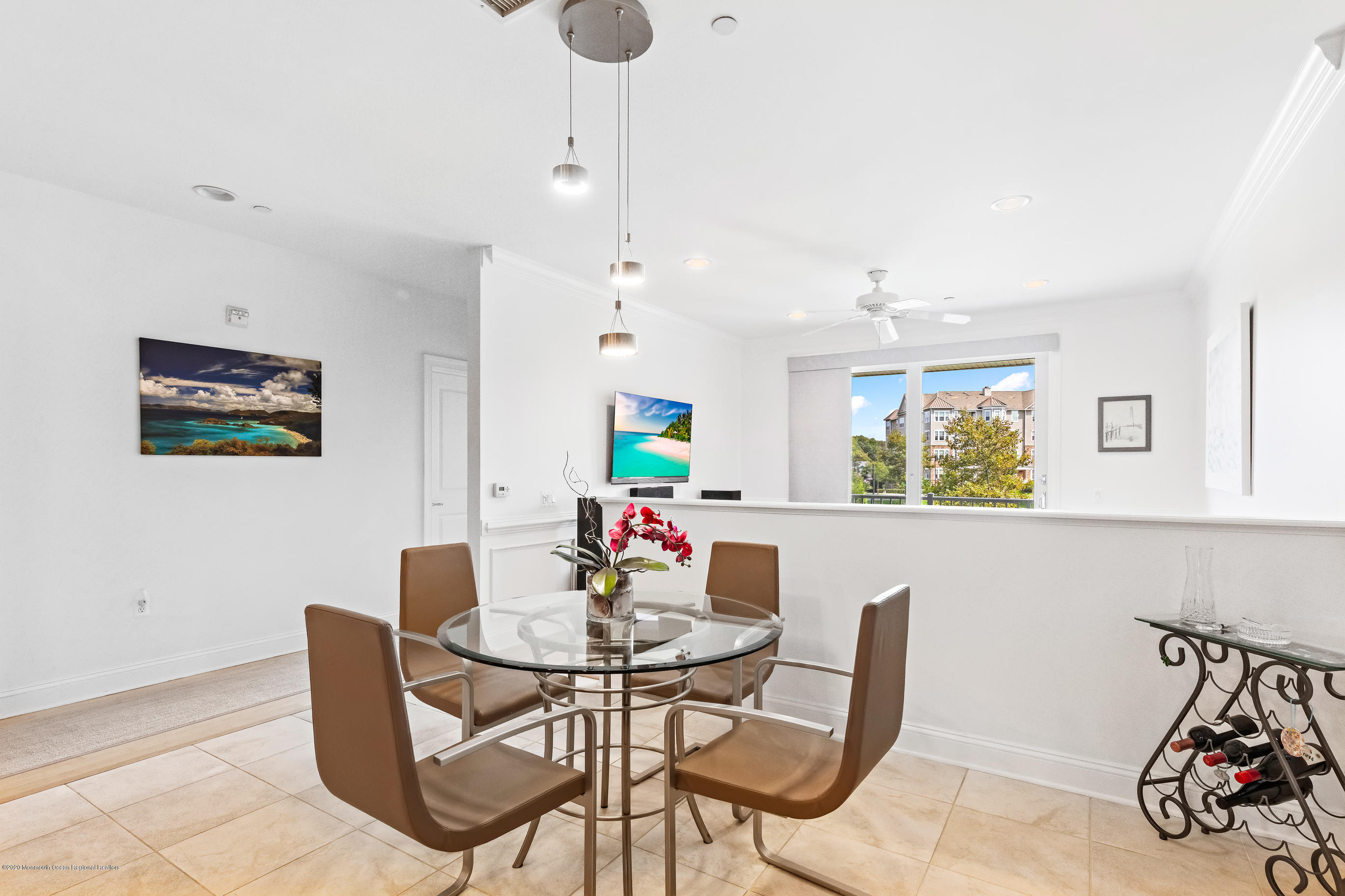 2201 River Road, Unit 1203 Point Pleasant, NJ 08742 - Photo 27 of 51 a dining room with furniture and window