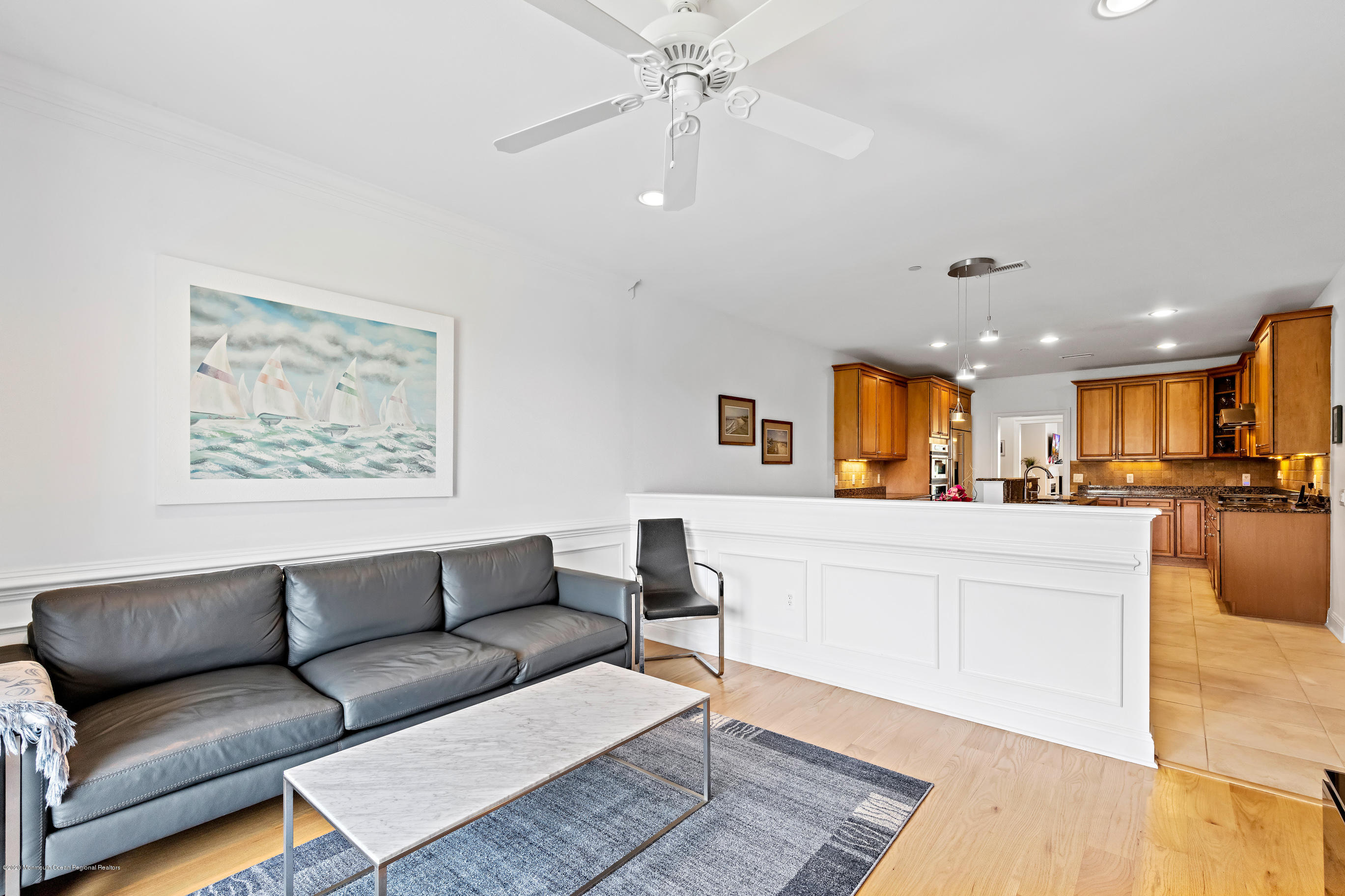 2201 River Road, Unit 1203 Point Pleasant, NJ 08742 - Photo 28 of 51 a living room with furniture and kitchen view