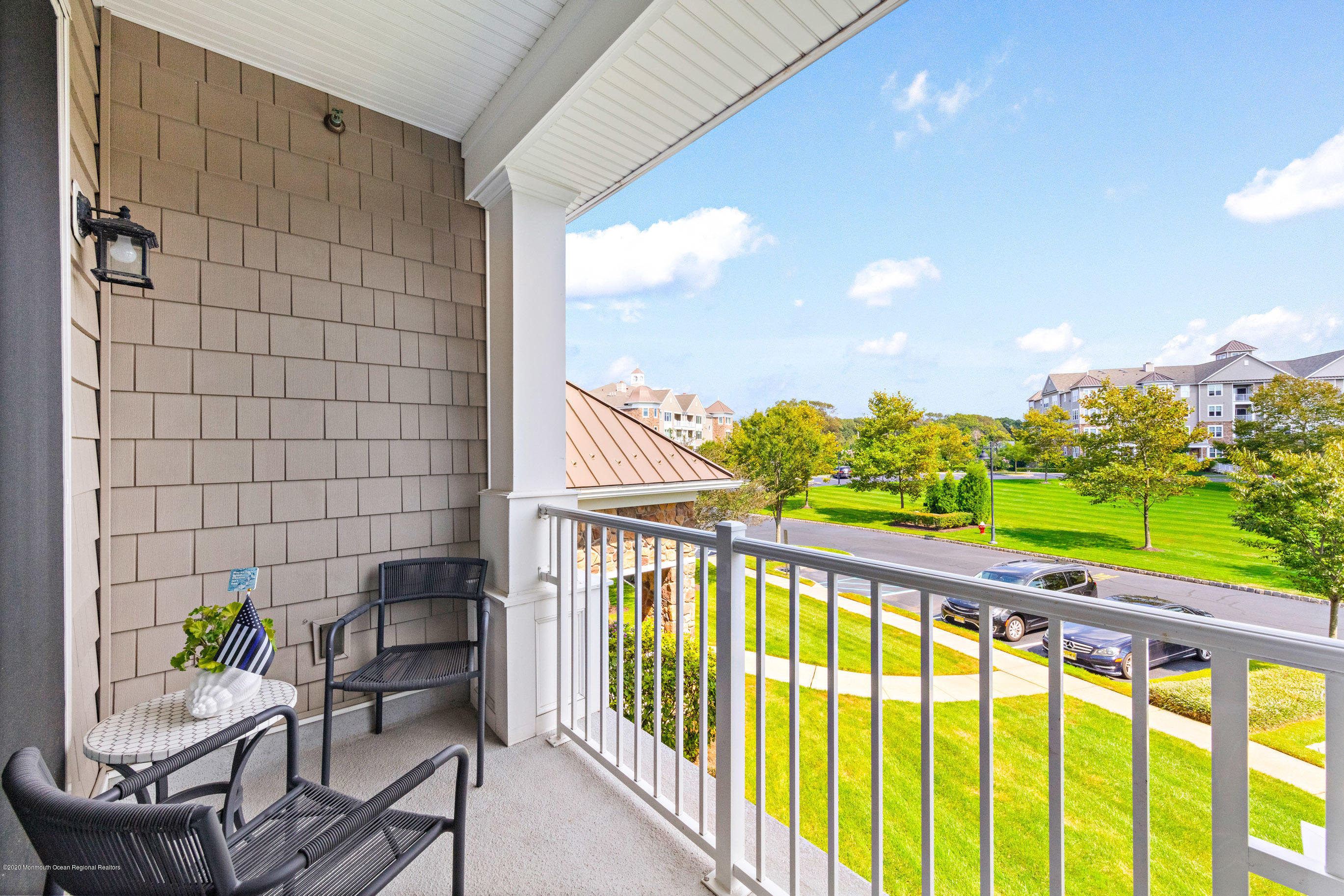 2201 River Road, Unit 1203 Point Pleasant, NJ 08742 - Photo 31 of 51 a view of a chairs and table in patio