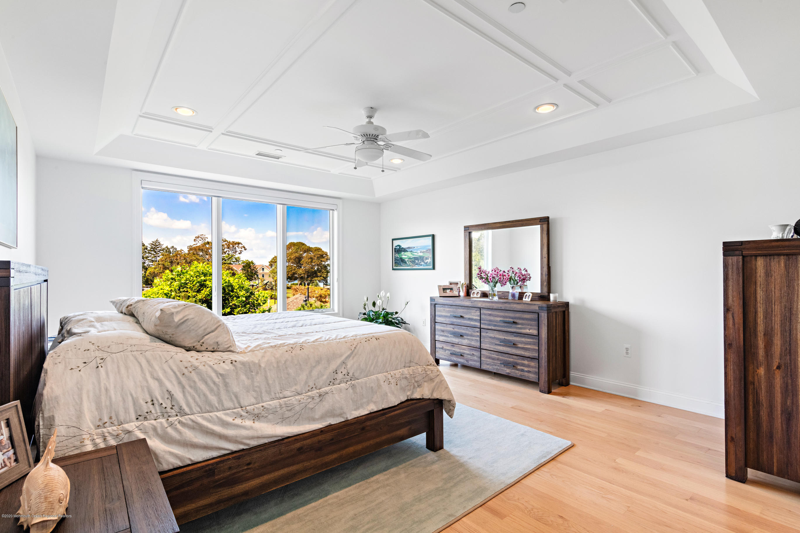 2201 River Road, Unit 1203 Point Pleasant, NJ 08742 - Photo 32 of 51 a bedroom with a large bed and a window