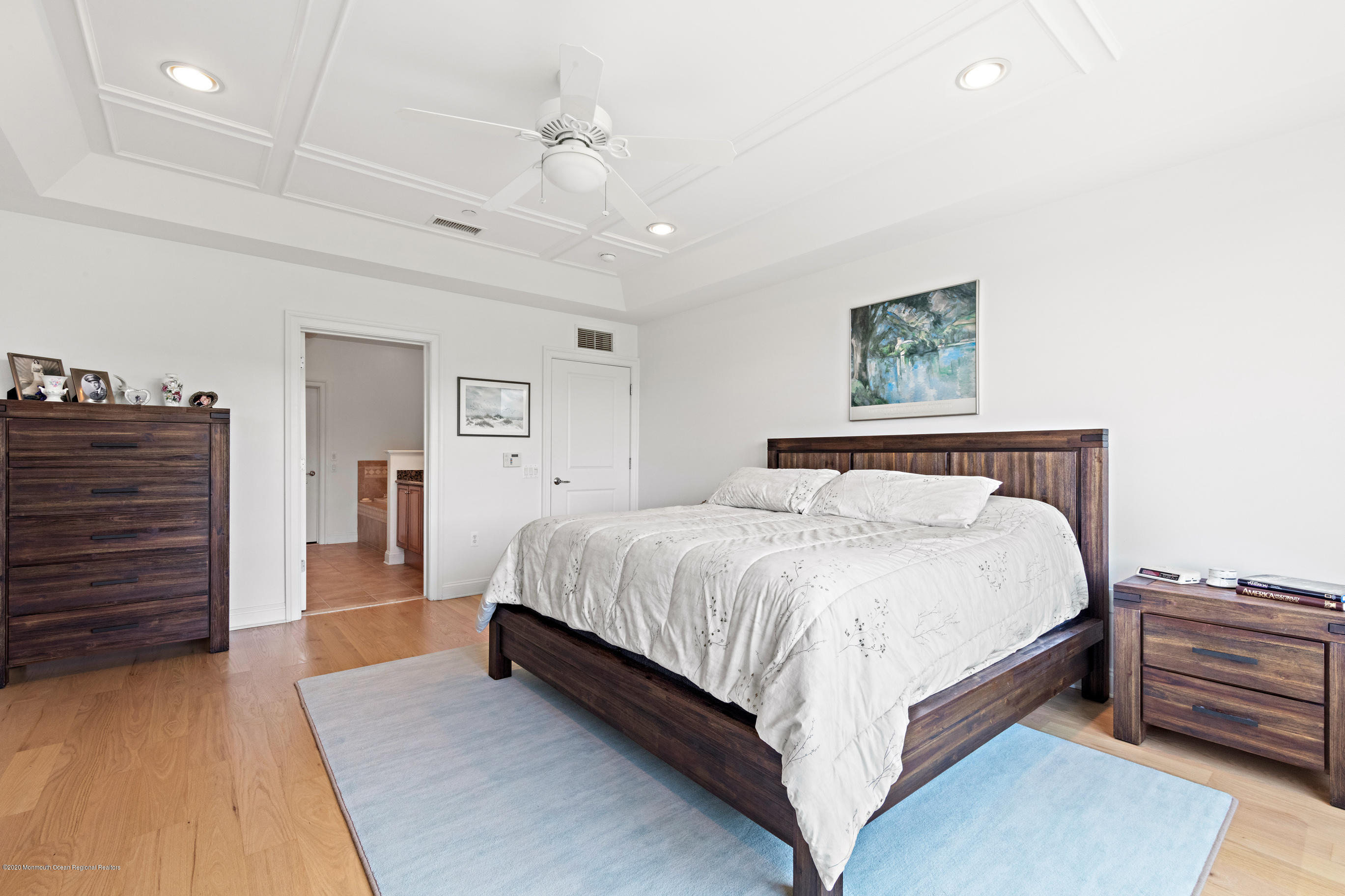 2201 River Road, Unit 1203 Point Pleasant, NJ 08742 - Photo 34 of 51 a large bed sitting in a spacious bedroom and a dresser