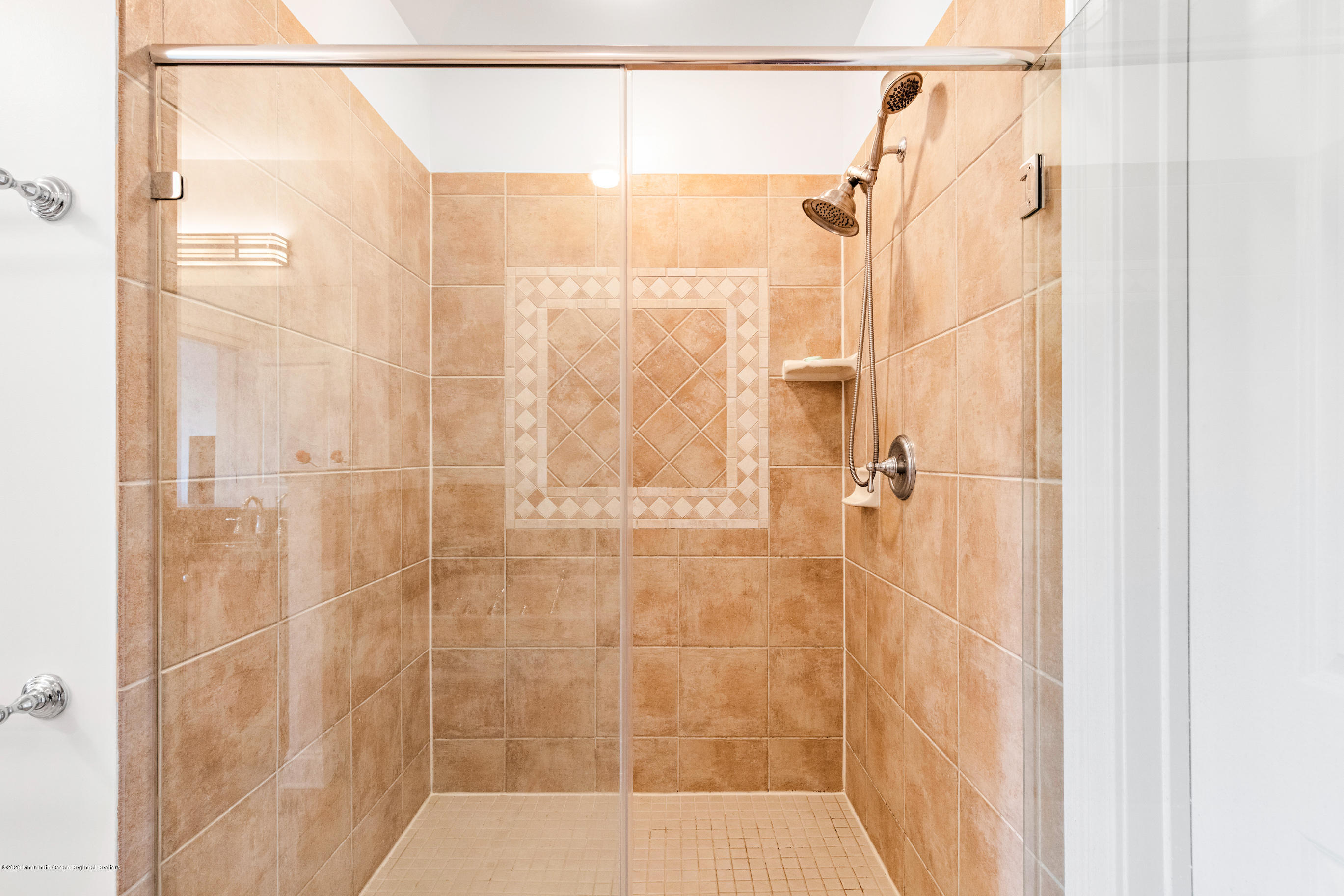 2201 River Road, Unit 1203 Point Pleasant, NJ 08742 - Photo 39 of 51 a bathroom with a shower
