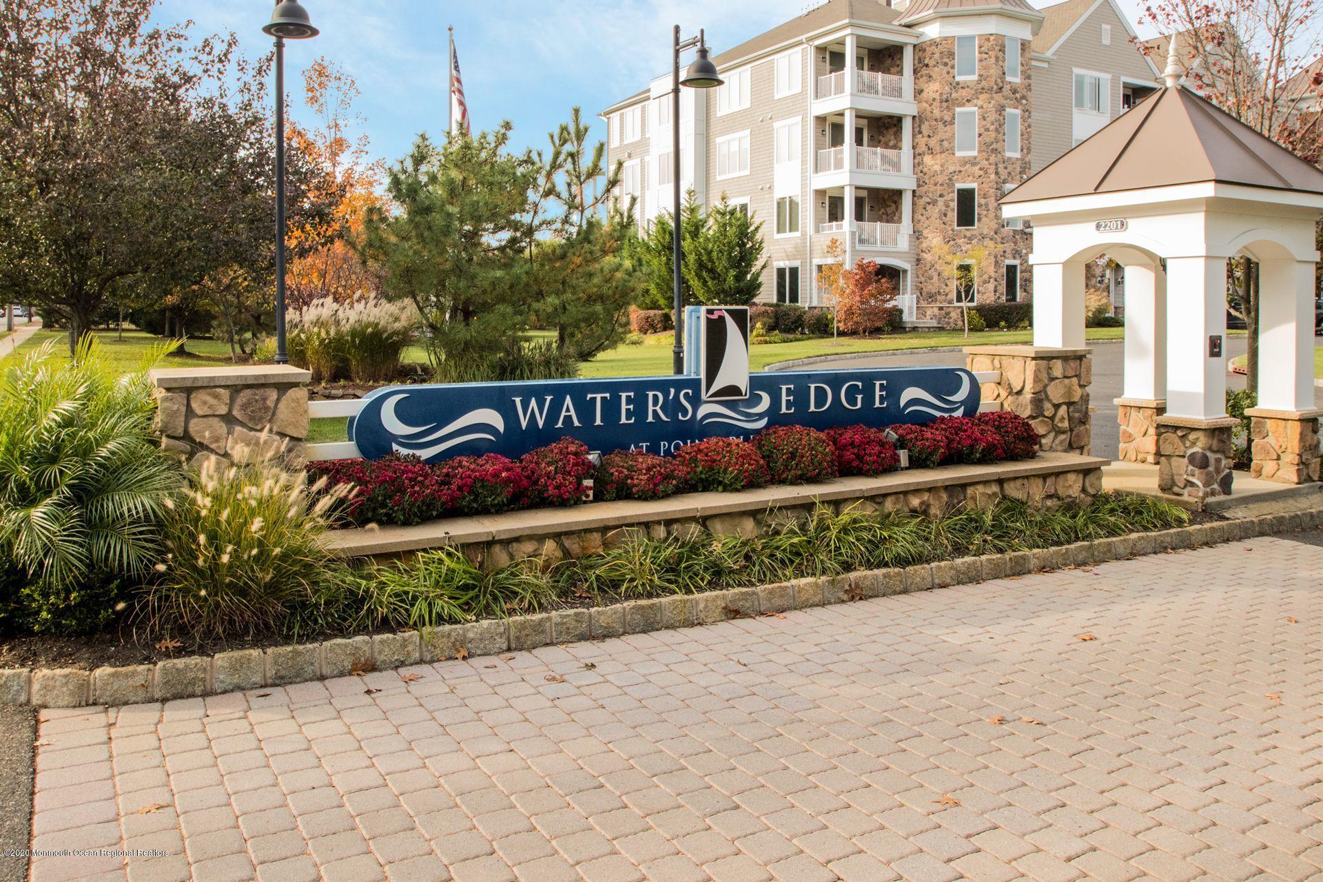 2201 River Road, Unit 1203 Point Pleasant, NJ 08742 - Photo 51 of 51 a sign on the side of a building