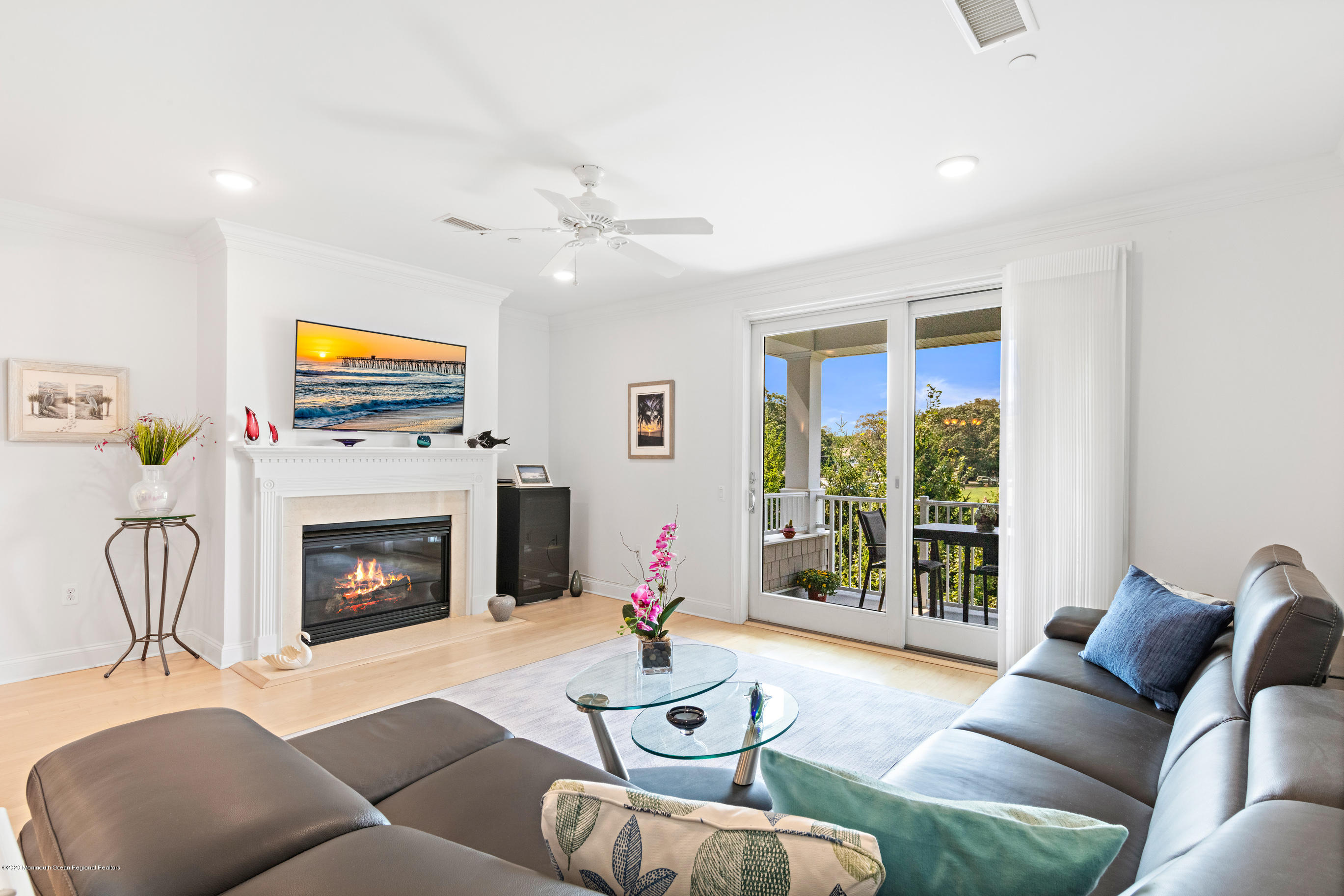 2201 River Road, Unit 1203 Point Pleasant, NJ 08742 - Photo 10 of 51 a living room with furniture fireplace and window