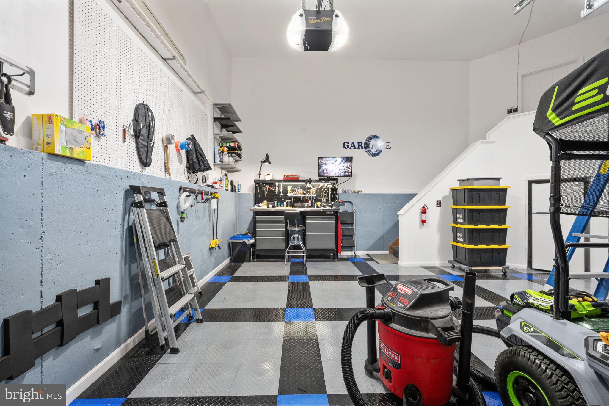 14541 Old Mill Road Centreville, VA 20121 - Photo 103 of 109 Modern garage with organized tools.