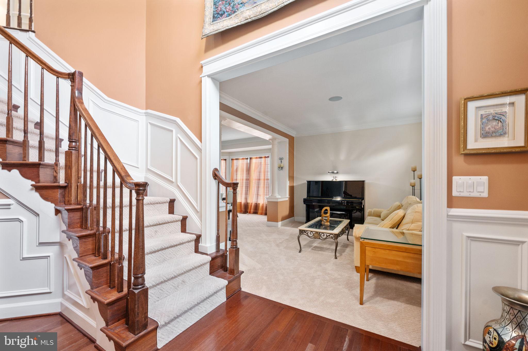 14541 Old Mill Road Centreville, VA 20121 - Photo 12 of 109 Elegant entryway with staircase charm.