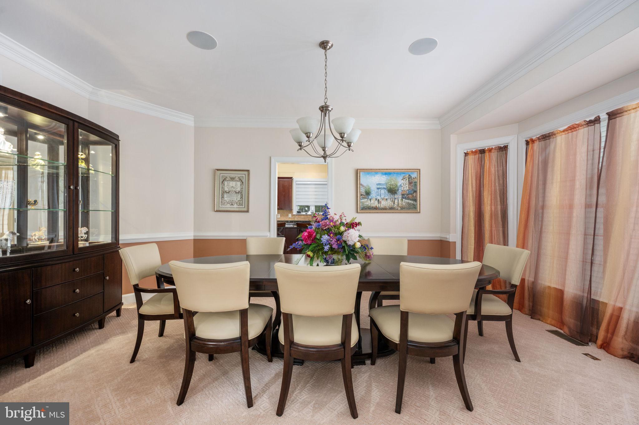 14541 Old Mill Road Centreville, VA 20121 - Photo 16 of 109 Elegant dining space with warm tones.