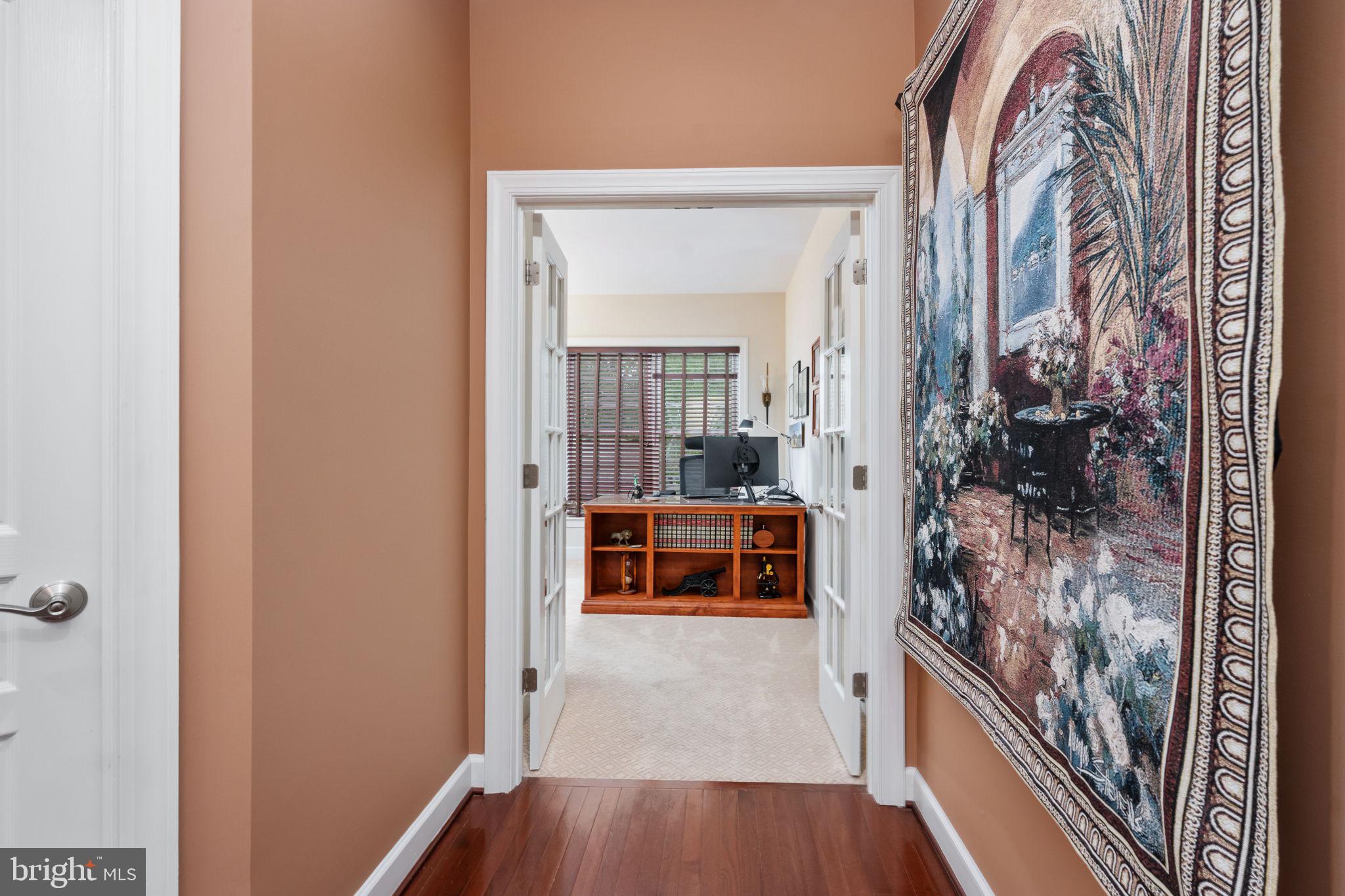 14541 Old Mill Road Centreville, VA 20121 - Photo 21 of 109 Inviting hallway with artistic flair.