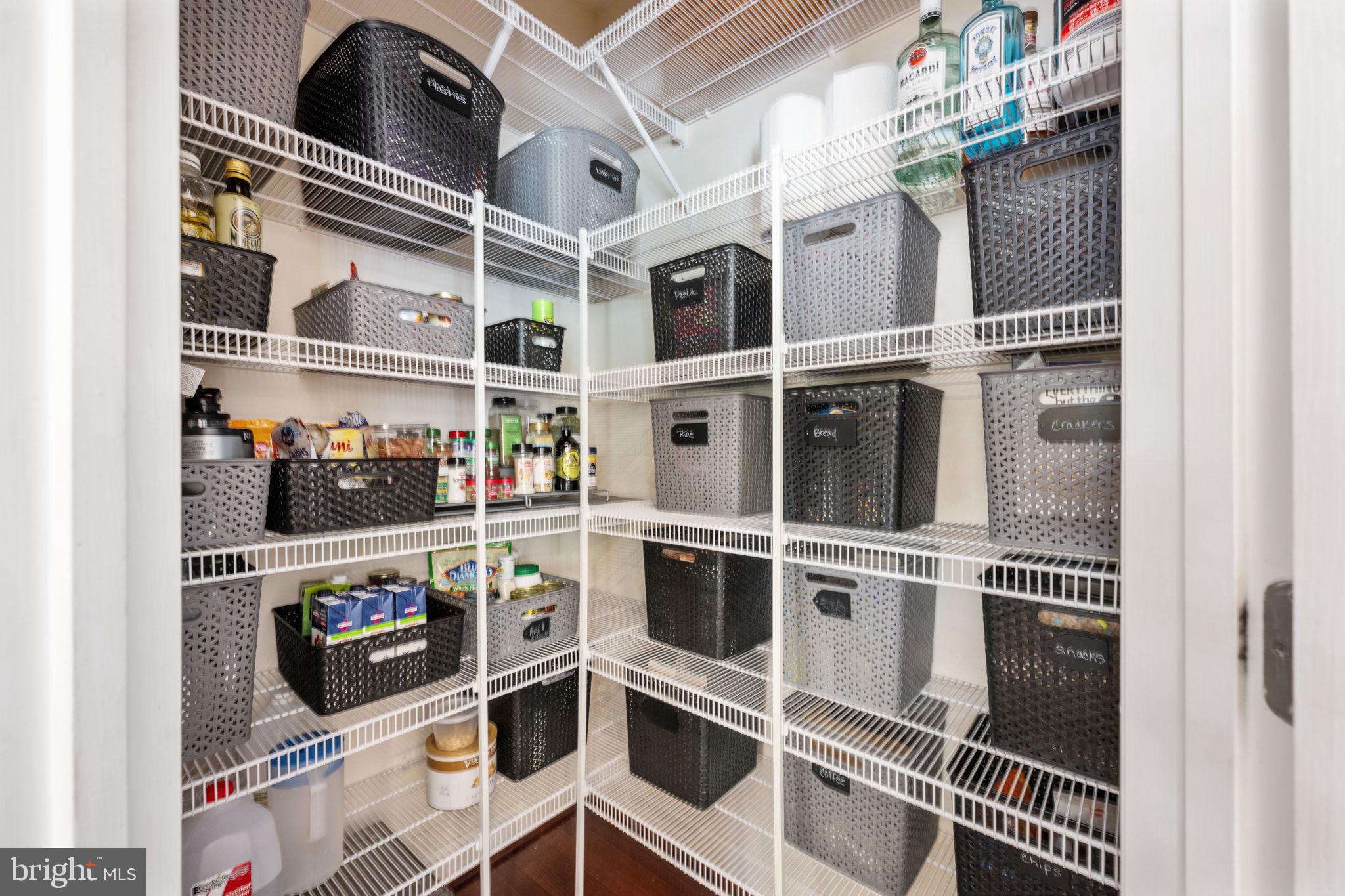 14541 Old Mill Road Centreville, VA 20121 - Photo 43 of 109 Organized pantry with stylish storage.