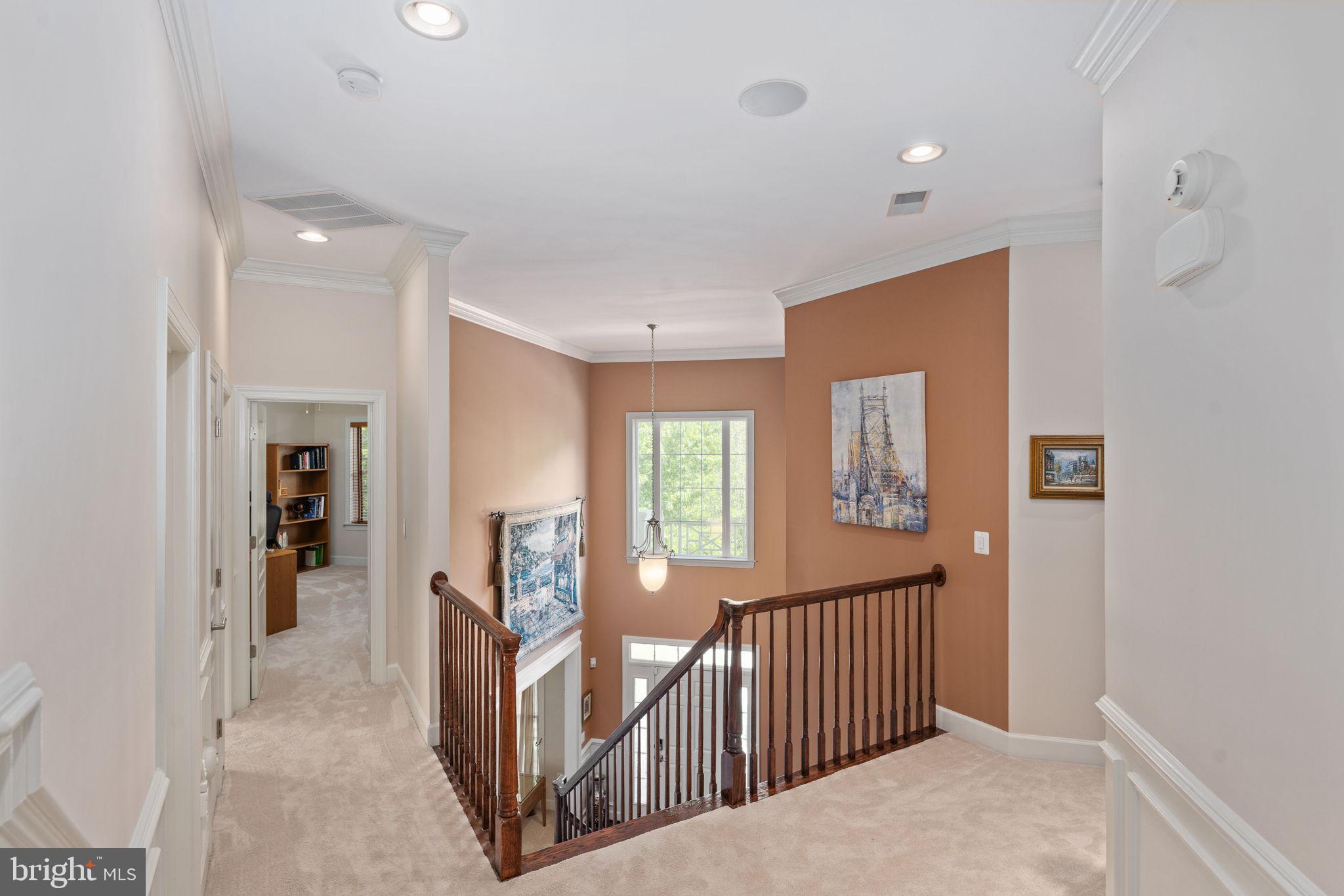 14541 Old Mill Road Centreville, VA 20121 - Photo 45 of 109 Elegant staircase with warm hues.
