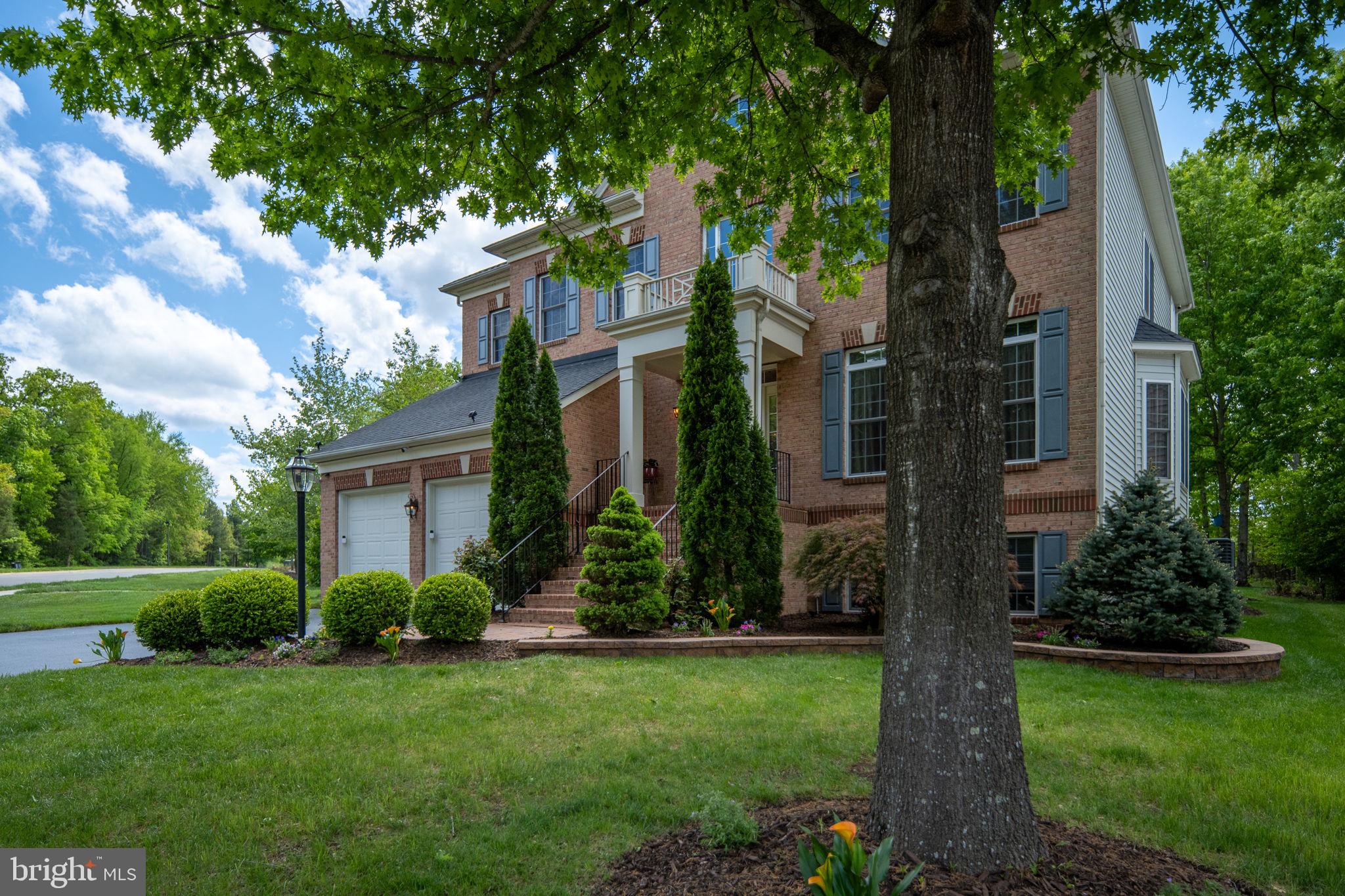 14541 Old Mill Road Centreville, VA 20121 - Photo 5 of 109 Charming brick home with lush landscaping.