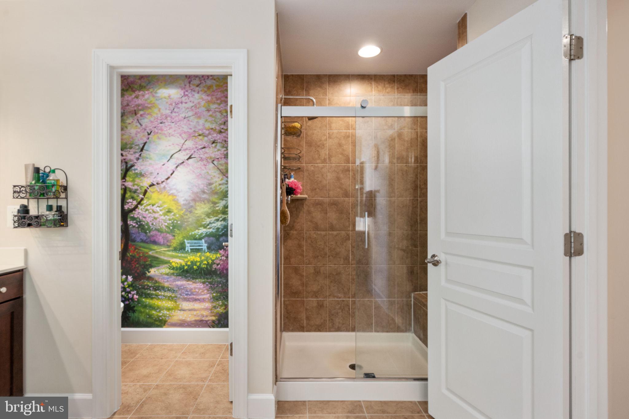 14541 Old Mill Road Centreville, VA 20121 - Photo 56 of 109 Serene bathroom with nature mural.