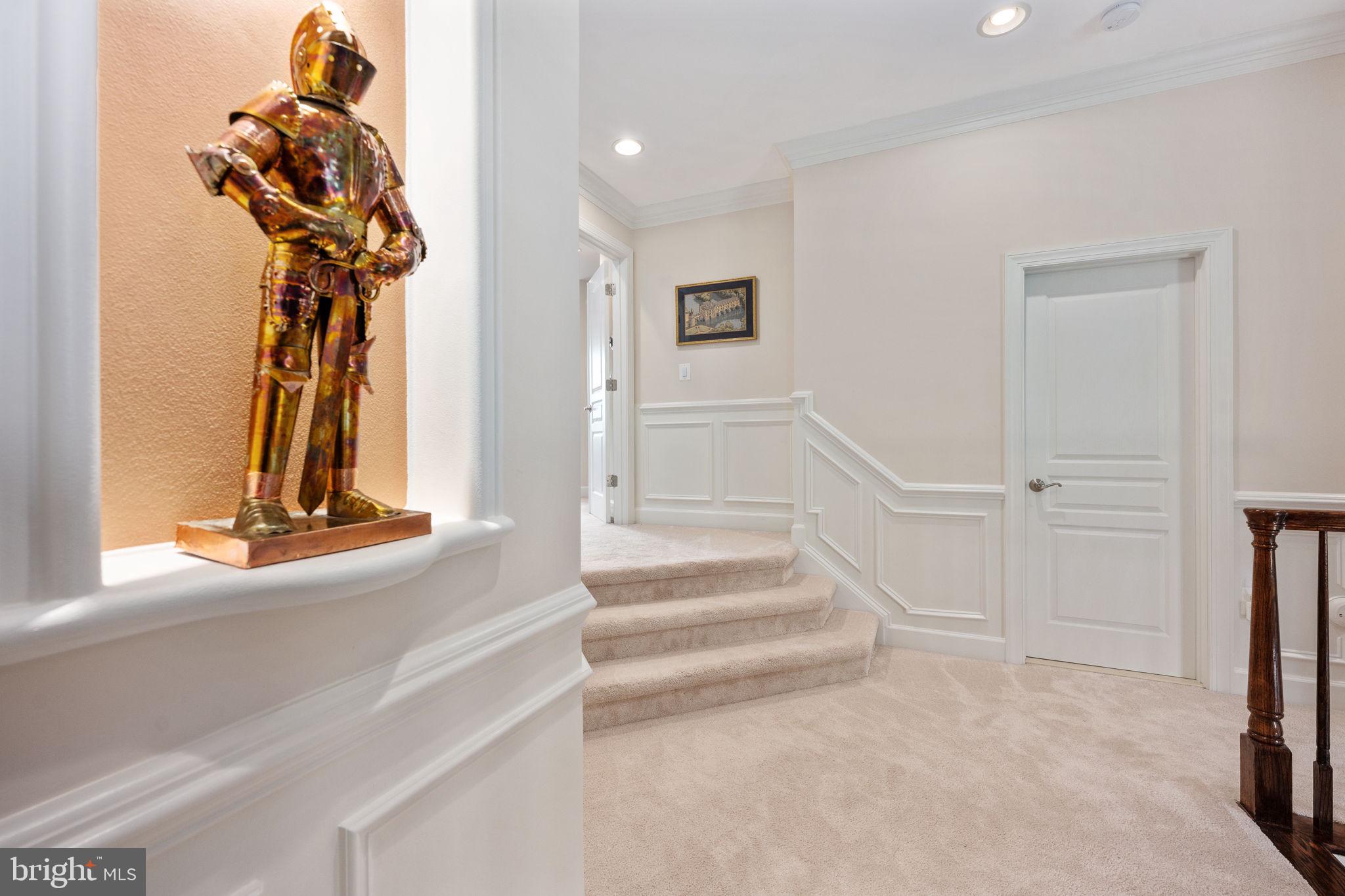 14541 Old Mill Road Centreville, VA 20121 - Photo 58 of 109 Elegant entryway with a knight statue.