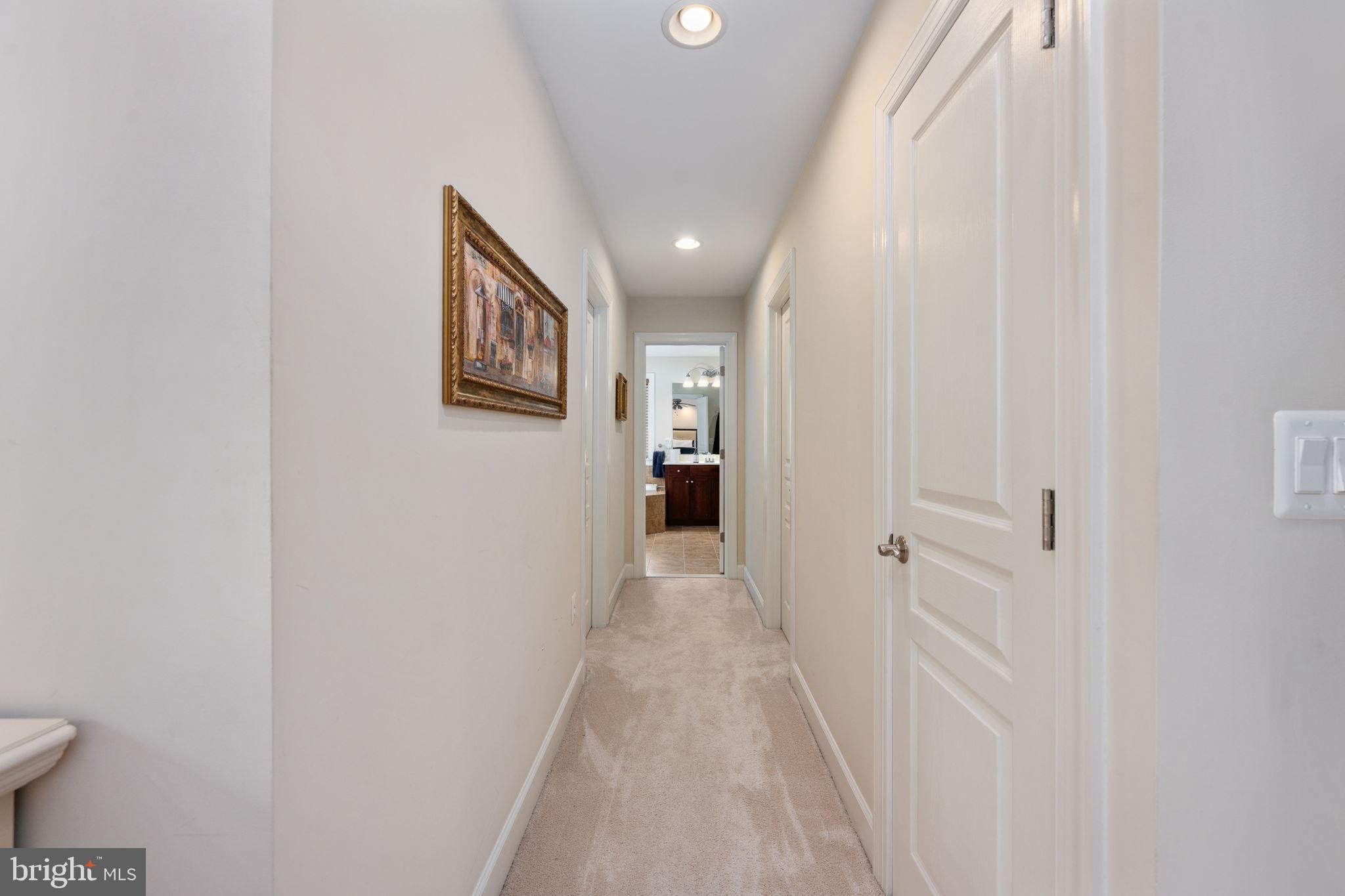 14541 Old Mill Road Centreville, VA 20121 - Photo 59 of 109 Inviting hallway with soft lighting.