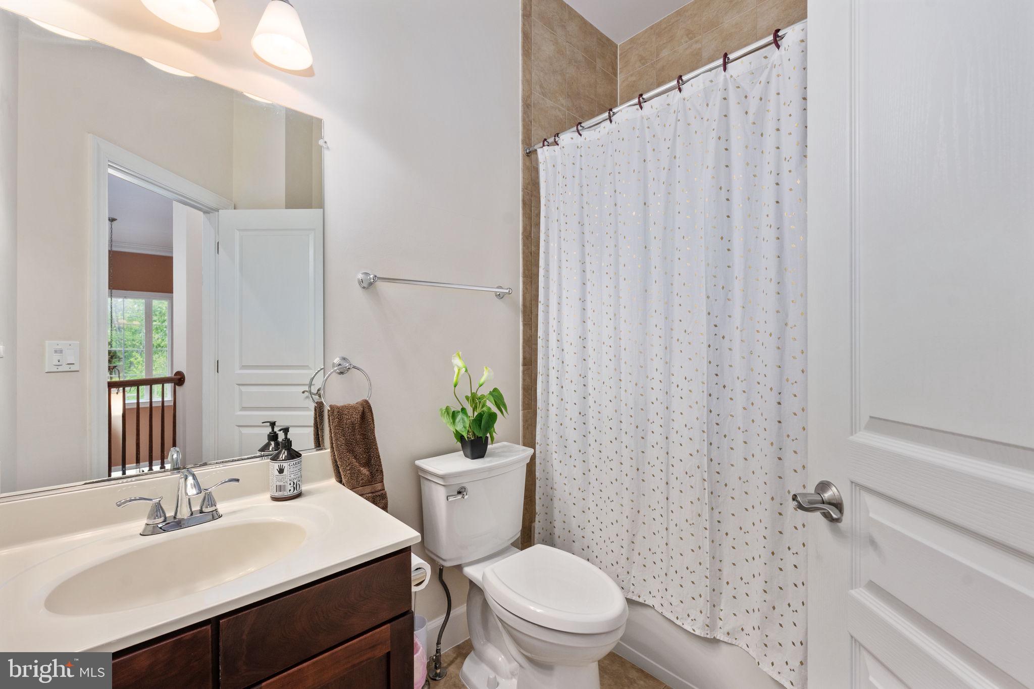 14541 Old Mill Road Centreville, VA 20121 - Photo 69 of 109 Modern bathroom with natural light.
